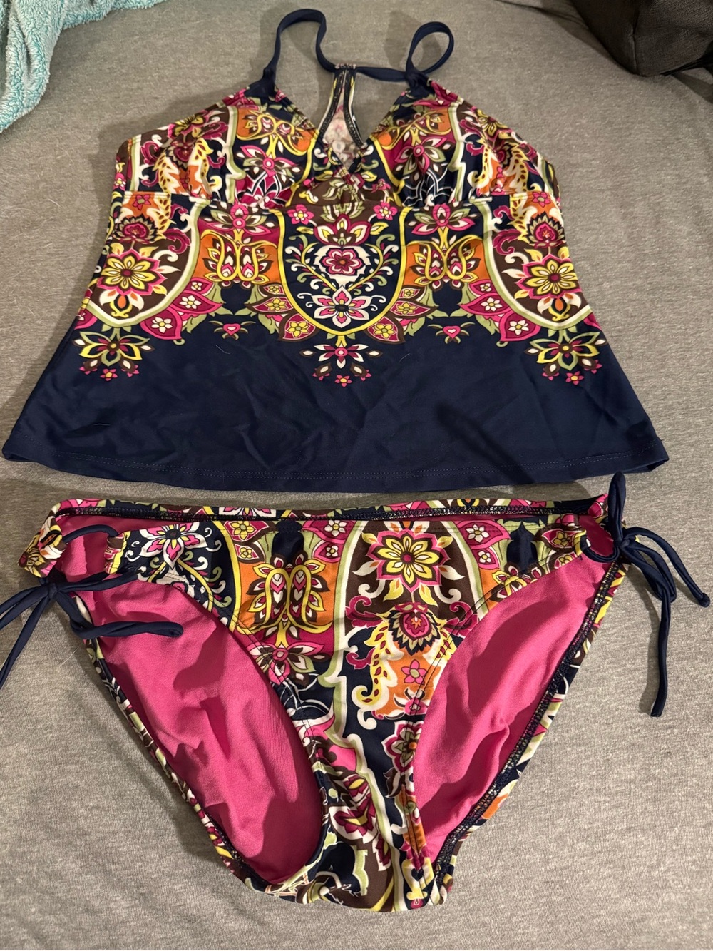 Multicolored tankini swimsuit on a navy blue base